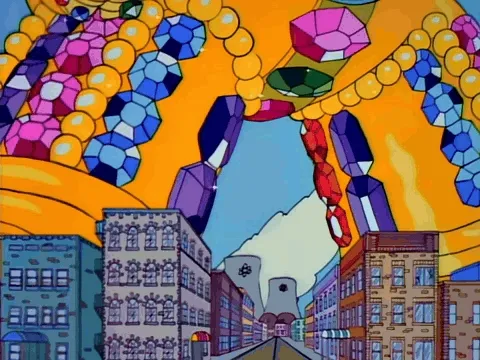 A jewel-encrusted golden Homer laughing maniacally.